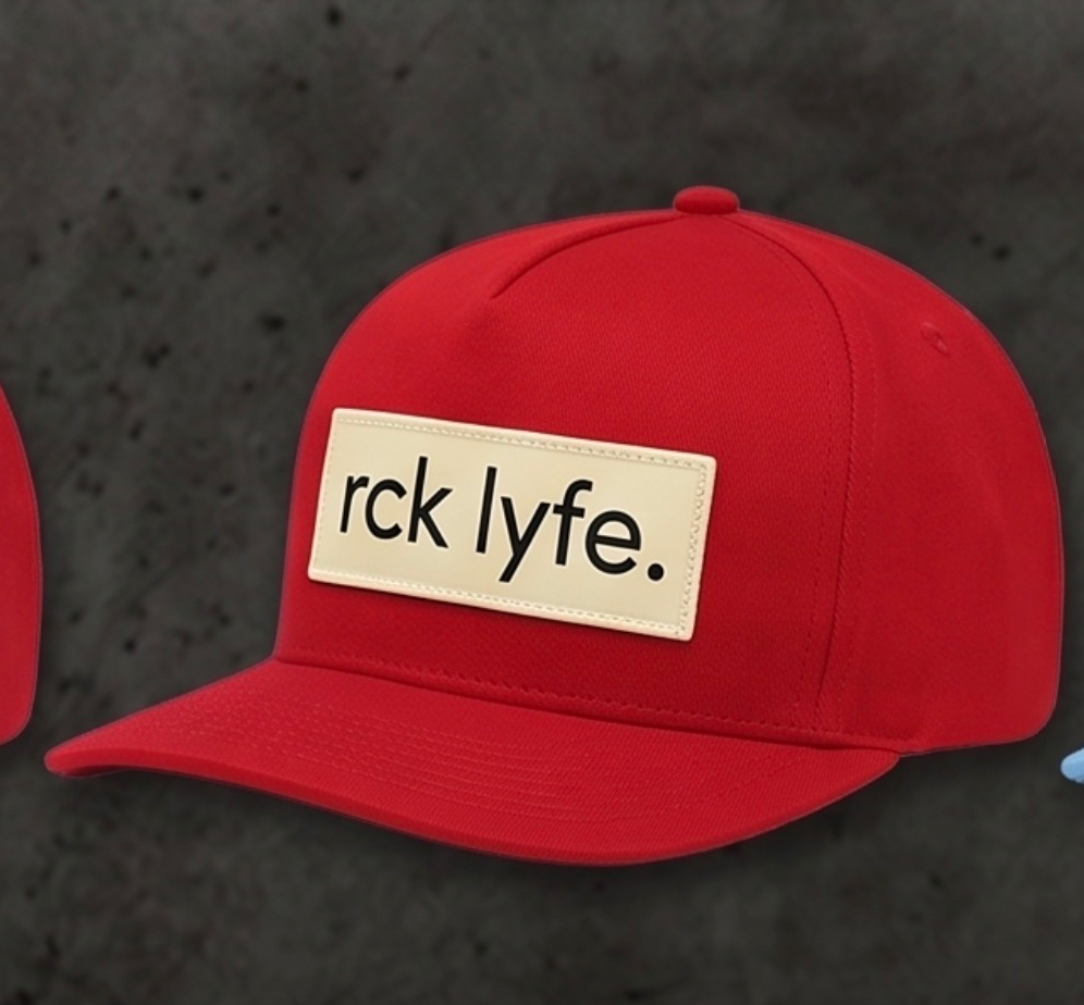 Red RCK Lyfe 5-panel snapback with cream patch and black rck lyfe. logo